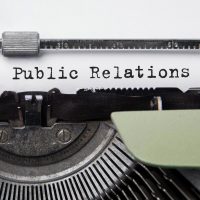 Text,Public,Relations,Typed,On,Retro,Typewriter